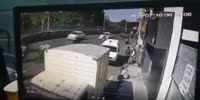 Riders fall under truck
