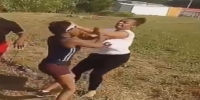 Girl picks a fight with entire hood