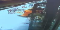 NY taxi slams into a busy restaurant during lunchtime in Hell's Kitchen