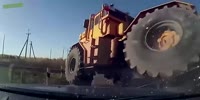 Real road crash test by huge tractor