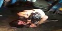 Drunk women fight outside street bar