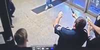 Lunatic With a Knife Walks into Police Station