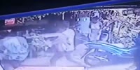 Thai guy catches stray bullet