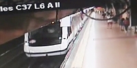 Madrid Subway: Man Kicked onto the Tracks