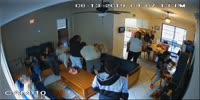 Caregiver at group home standing on disabled woman’s head