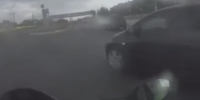 Biker films own crash in the rain