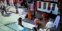 Woman killed by a cow in the street (R)