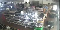 Thieves crawling on liquor store floor to avoid detection