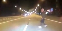 Psychotic Russian Throws Himself Under Car Wheels