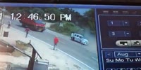 Couple on bike getting bowled