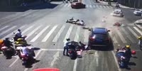 Car slams through group of riders