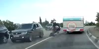 Crimea bikers clip a car, make a flight