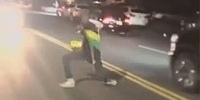 Dancing Man in Street Struck by Car