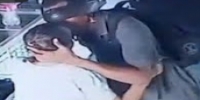 Robber kisses victim