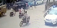 Gang Attack on a Busy Road