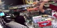 Robber with huge knife gets his ass beaten by owner & customer