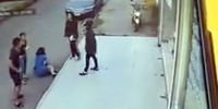 CCTV - Girl Beaten in the Street