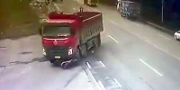 Biker Flattened by Dump Truck