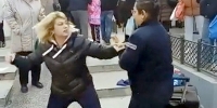 Street Vendor Attacks Cop in Serbia