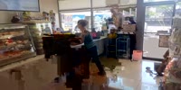 Crazy woman freaks out in 7-11