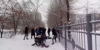 Camera woman stops mass street fight in Russia
