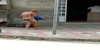 Drugged or mentally ill dude walks naked in the duty streets of Brazil