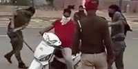 Indian Police Punish Quarantine Jumpers
