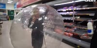 British Woman Roams Supermarket In Zorb Ball
