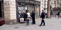 Black woman coughs on Paris cops