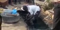 Dude caught washing fruits for sale in the mud