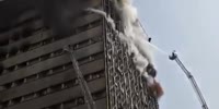 A large fire in the Khomeini building in Iran, killing and wounding civilians and firefighters