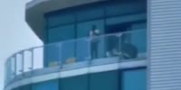 UK police respond to 'man firing machine gun from balcony
