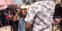 Not really ugly African woman chased by vendors after theft attempt