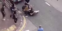 Girl who tried to remove the road barriers protesters set up on the road was assaulted by HongKong protesters