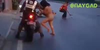 Nude chick tries to pal with police