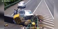 Car smashes into highway barrier head-on in southern China