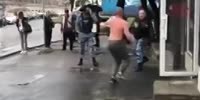 Shirtless rebel without a cause fights the police in Ukraine