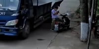 Truck Hatch Knocks Lady the Fuck Out