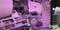 Another Chinese Biker Loses Fight with a Truck