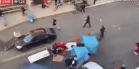 Rioter shot attacking driver