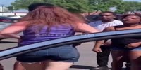 White woman attacked by black ones over parking lot space
