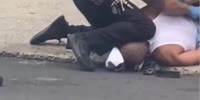 Another Cop Kneeling on Man’s Neck