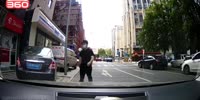 Flipping Car Knocks Pedestrian in China