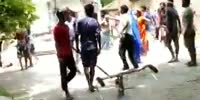Villagers Fight With Sticks