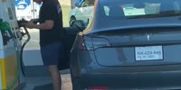 Dude Tries to Fuel Tesla