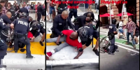 COPS JACK UP PARALYZED PROTESTER