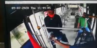 Passenger in Red Mask Robs the Bus Driver