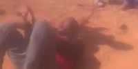 Handcuffed Robber Cruelly Beaten By Mob in Zimbabwe