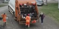 Girl In Headphones Gets Crushed By Garbage Truck