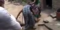 Lady Beaten In Indian Slums